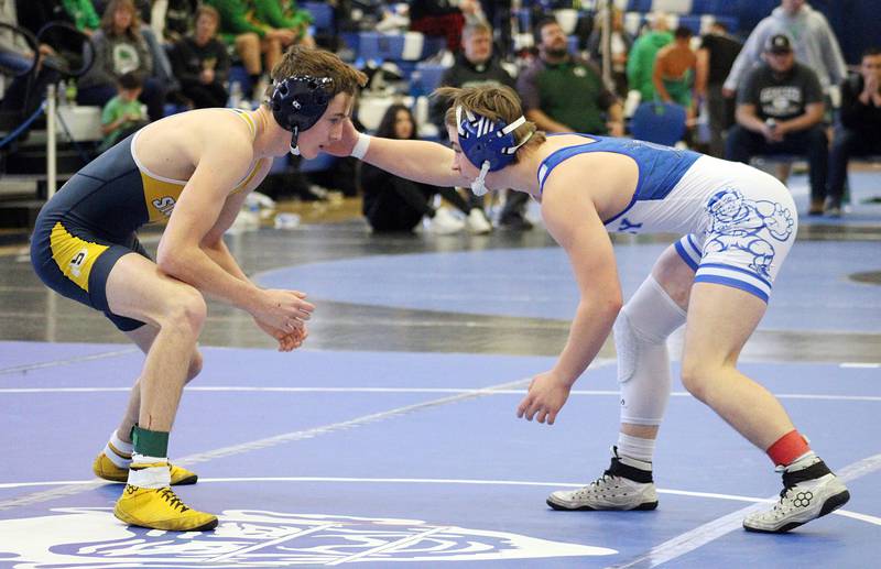 Sterling’s Dylan Ottens (left) and Quincy’s Brody Baker face off in 138-pound title at the Western Big 6 Conference meet Saturday Jan. 28, 2023 in Quincy. Ottens took the title.