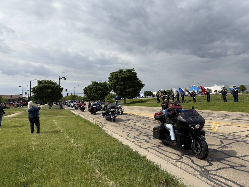 Riders with the Combat Veterans Motorcycle Association depart the Hampton Inn in Ottawa as community members and American Legion Post 33 line Veterans Drive, waving flags and showing their support on Saturday, May 24, 2025.