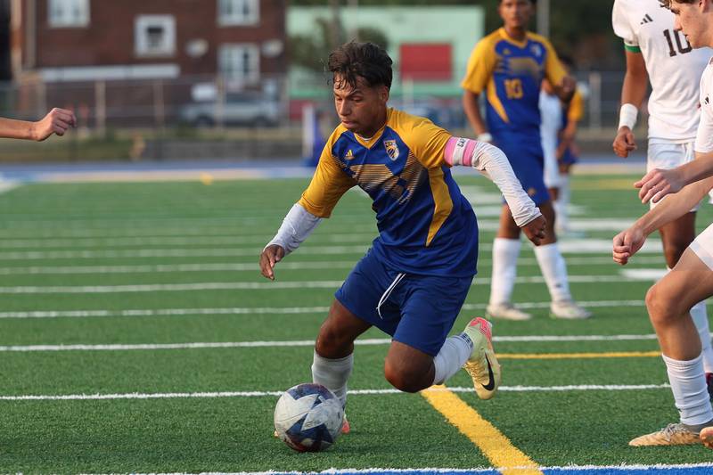 Joliet Central’s Ricardo Camacho works the ball against Joliet Catholic on Monday, Sept. 9, 2024 in Joliet.