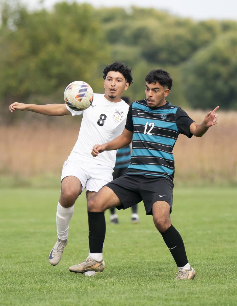 Harvard's Edgar Robles and Woodstock North's Ruben Carreno battle for the ball during the Kishwaukee River Conference Tournament Championship game on Monday, October 6, 2025 at Woodstock North High School. Ryan Rayburn for Shaw Local
