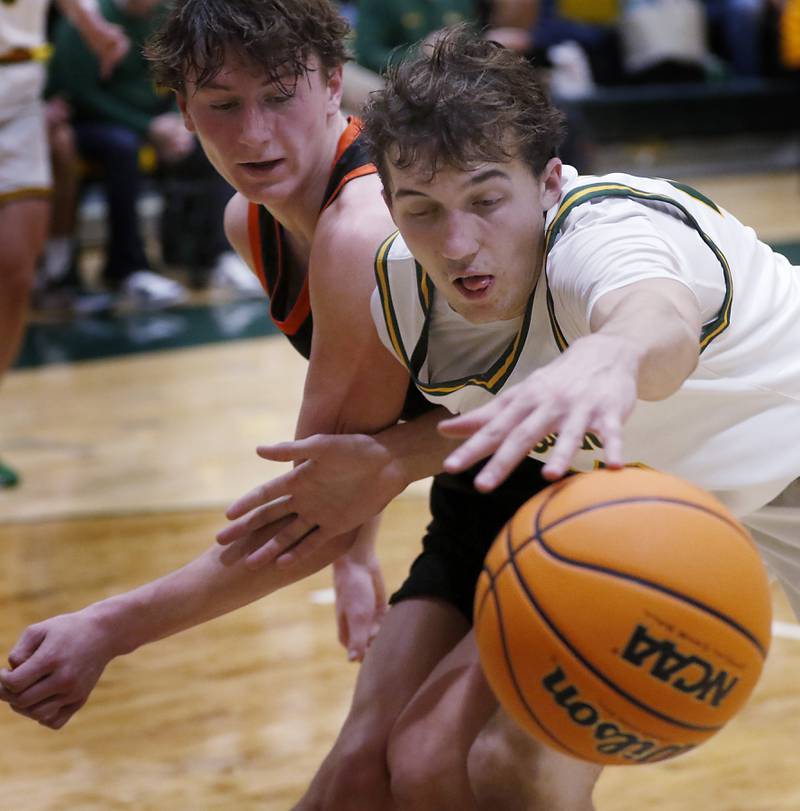 Crystal Lake South's Anthony Santarelli battles with McHenry's Dylan Hurckes for the ball during a Fox Valley Conference basketball game on Friday, Jan. 31, 2025, at Crystal Lake South High School.
