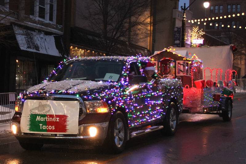 A float decorated by Martinez Tacos participates in the Kankakee Christmas Parade on Saturday, Dec. 13, 2025