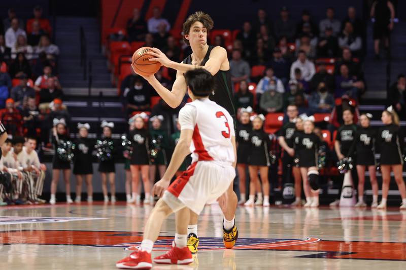 Glenbard West’s Braden Huff looks to pass against Bolingbrook in the Class 4A semifinal at State Farm Center in Champaign. Friday, Mar. 11, 2022, in Champaign.