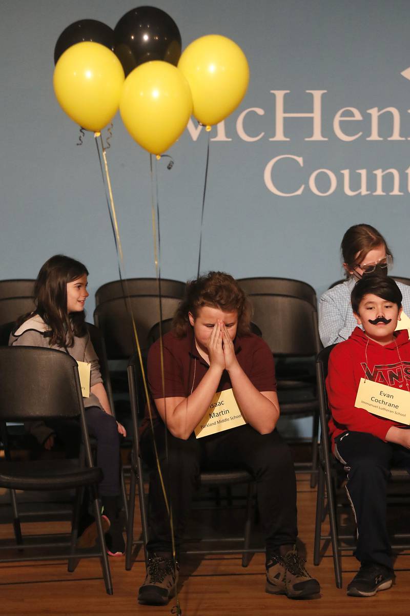 Isaac Martin of Parkland Middle waits on stage for the spelling bee to begin on Wednesday, March 22, 2023, at McHenry County College's Luecht Auditorium in Crystal Lake.