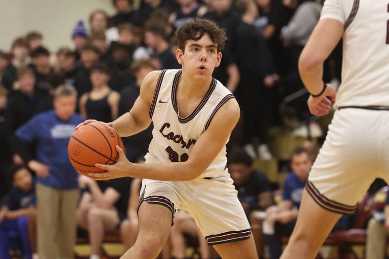 Lockport’s Evan Dziadkoweic looks for a play against Lincoln-Way East on Friday, Dec. 1, 2023 in Lockport.