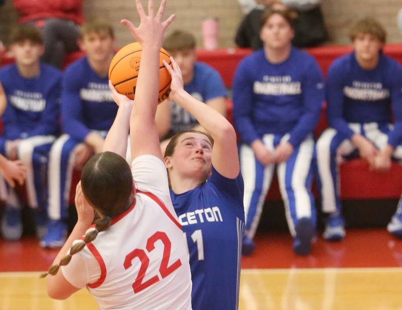 Princeton's Makayla Hecht eyes the hoop as Ottawa's Marlie Orlandi defends on Monday, Feb. 3, 2025 in Kingman Gymnasium at Ottawa High School.