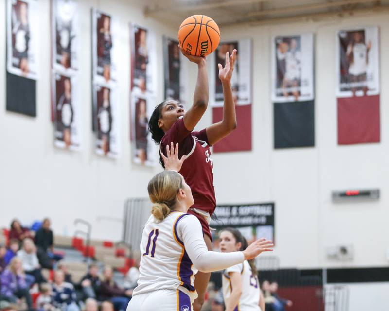Plainfield North's Anaya Patterson (15) shoots at the rim during their Regional Final basketball game between Downers Grove North at Plainfield North. Feb 20, 2025 in Plainfield.