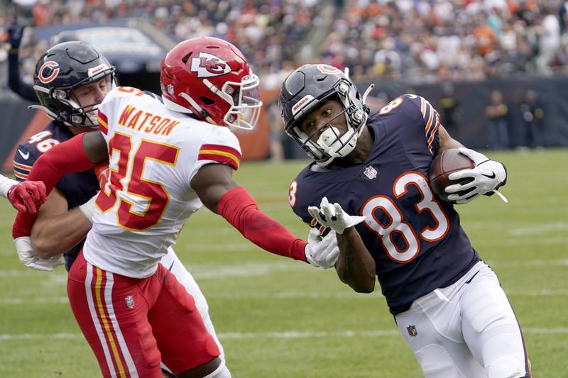 Chicago Bears wide receiver Dazz Newsome carries the ball past Kansas City Chiefs cornerback Jaylen Watson during the second half Saturday, Aug. 13, 2022, in Chicago.