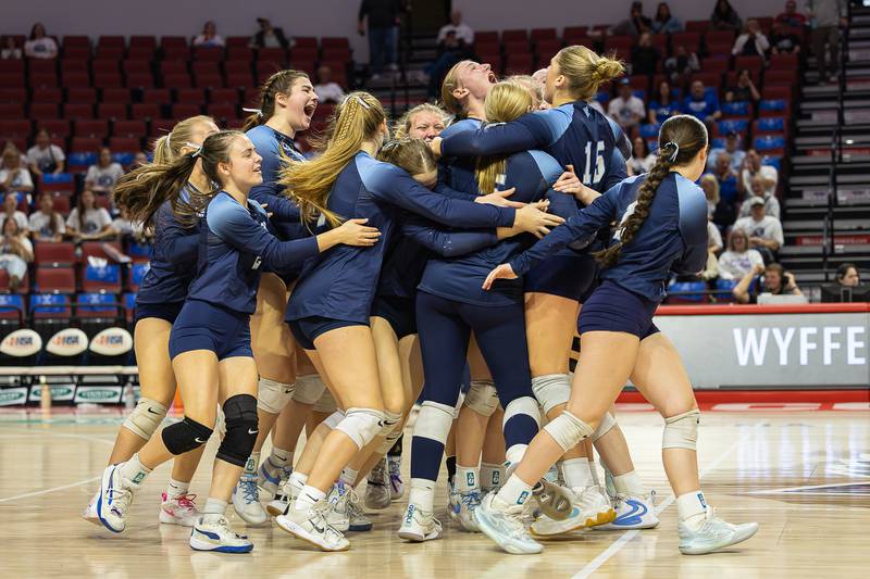 Cissna Park players celebrate following the Timberwolves' victory in two sets, 25-19, 25-20, over Tremont in the IHSA Class 1A State semifinals on Friday, Nov. 14, 2025.