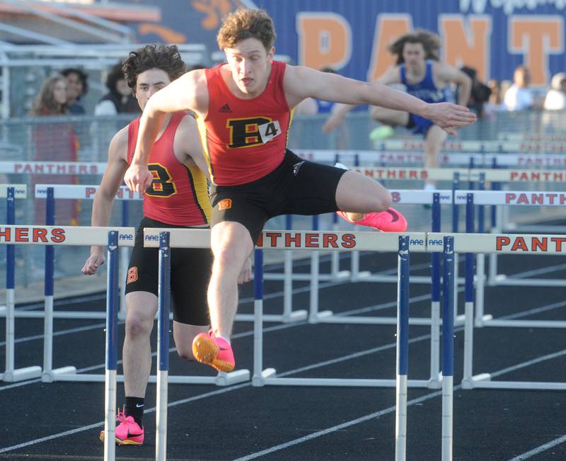 Batavia's Ben Matthews goes over the last hurdle in the varsity 110 Meter Hurdles during the Roger Wilcox Invitational at Oswego High School on Friday, Apr. 28, 2023.