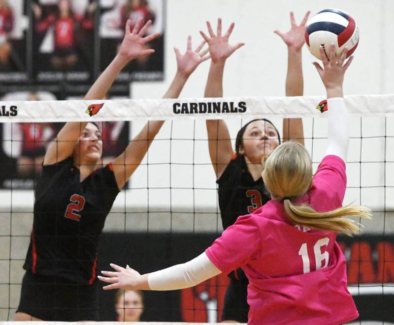 Fulton's Chloe Wilkin (2) and Kerby Germann (3) block a hit by Stillman Valley's Alivia Bagg at the Stillman Valley Tournament on Saturday, Oct. 25, 2025 at Stillman Valley High School.