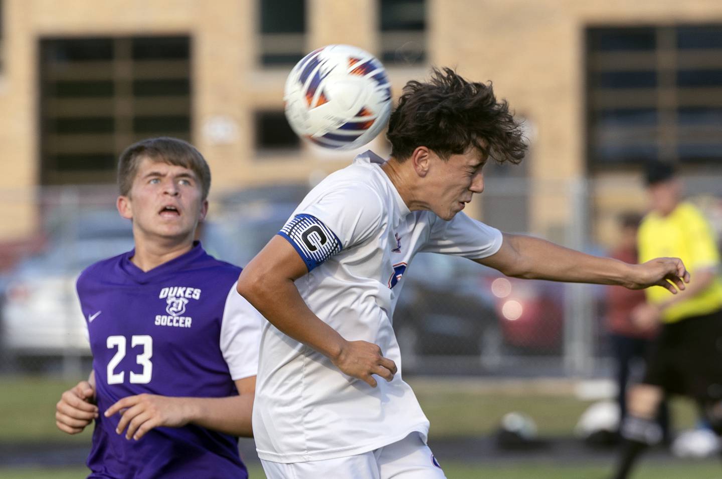 Genoa-Kingston’s Ayden Hernandez goes up for a header against Dixon’s Cameron Foulker Tuesday, Sept. 2, 2025.