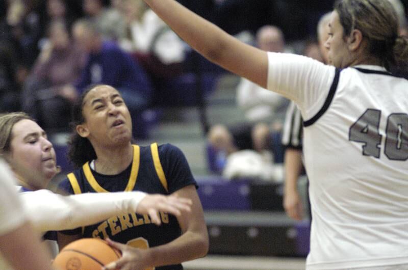Sterling's Delali Amankwaget pounded as she tries to go to the basket.t. Dixon and Sterling girls basketball teams played in the 3rd place game of the Dixon Girls KSB Holiday Basketball Classic Saturday, Dec. 28, 2024.