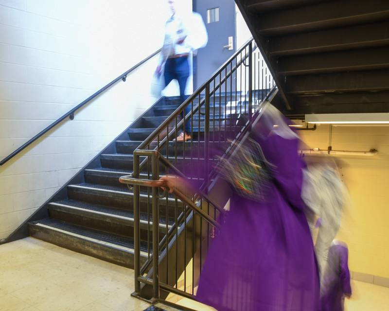 Graduates make their way to the field house before the start of graduation on Sunday May 19, 2024, held at Downers Grove North High School.