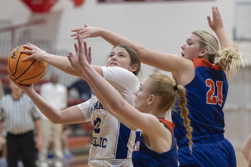 Newman’s Lucy Oetting looks to shoot against Eastland Tuesday, Feb. 18, 2025, during the Class 1A girls basketball regional at Forreston.