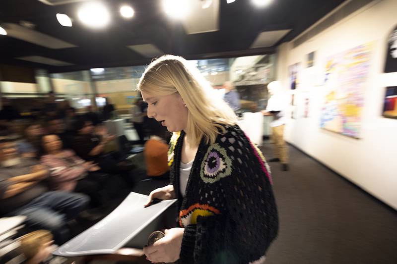 Allie Cook heads back after accepting an award Thursday, April 9, 2026, during the opening of SVCC’s annual art exhibit. Cook received one of three President’s Awards and was also awarded Best of Show.
