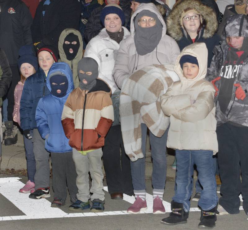 Those gathered for the Festival of Lights Parade Friday in Ottawa had to bundle up as temperatures were well below freezing.