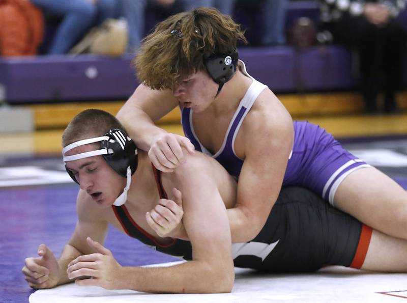 Hampshire's Knox Homola controls Huntley's Wyatt Theobald during the 285-pound match of a Fox Valley Conference wrestling meet on Wednesday, Jan. 8, 2025, at Hampshire High School.