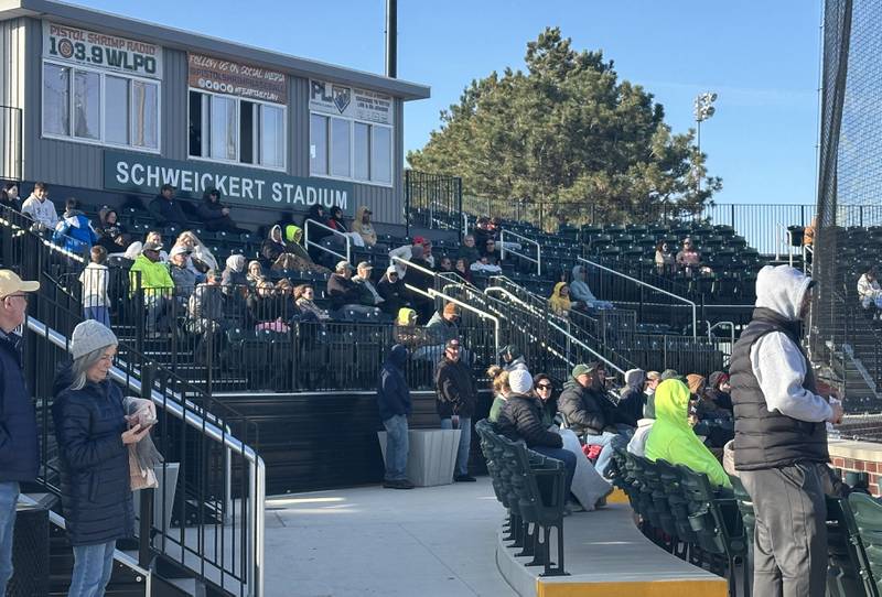 Fans watch a baseball game between Hall and St. Bede on Monday, March 31, 2025 at Schweickert Stadium in Peru.