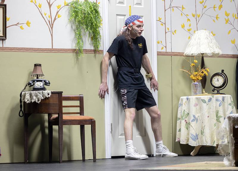 Kenen Callison rehearses a scene for Faith Christian’s spring play “Every Crook and Nanny” Tuesday, May 16, 2023.