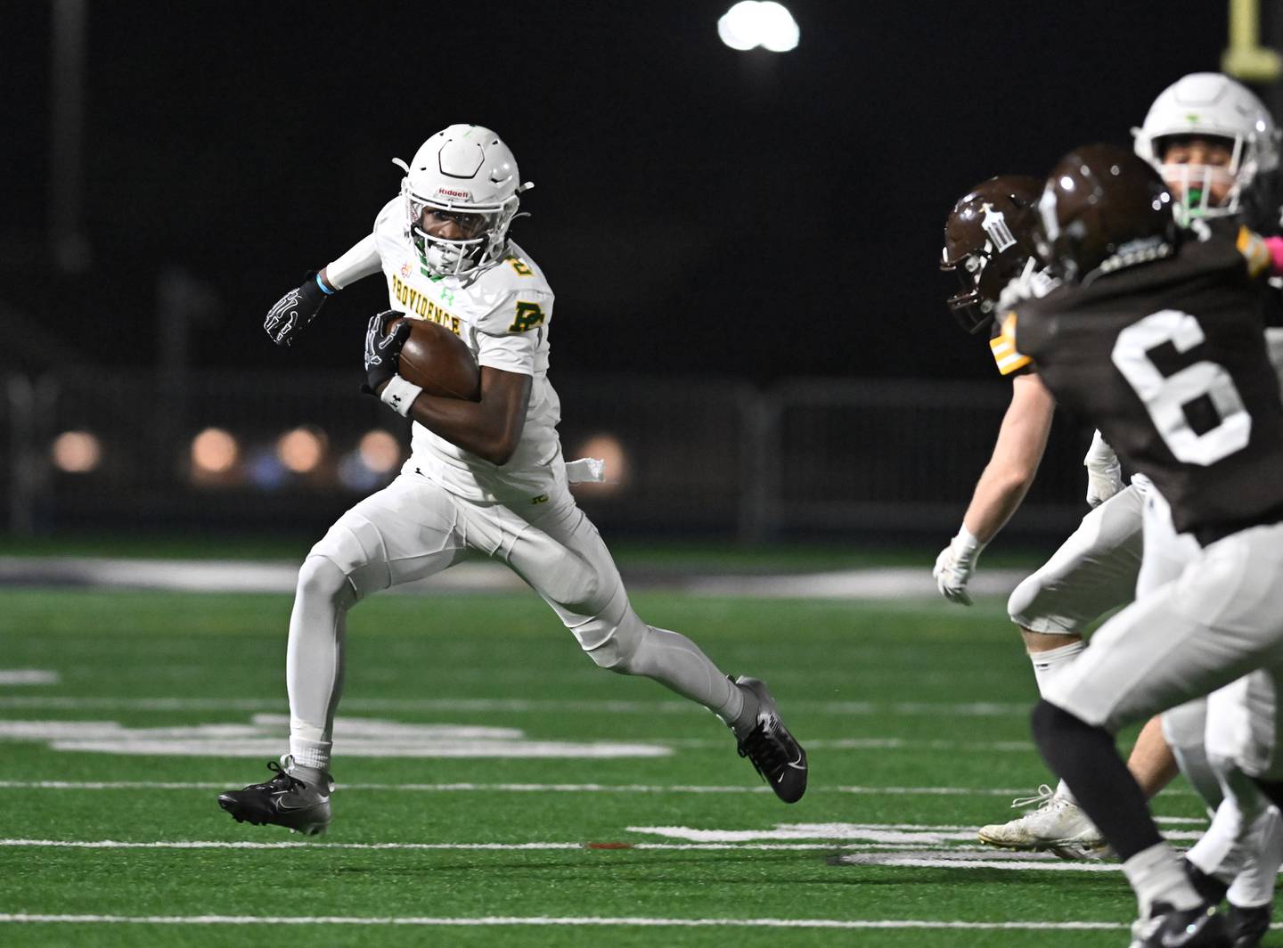 Providence Catholic's Xavier Coleman (2) runs the ball during the conference game against Joliet Catholic on Friday, OCT. 24, 2025, at Joliet.