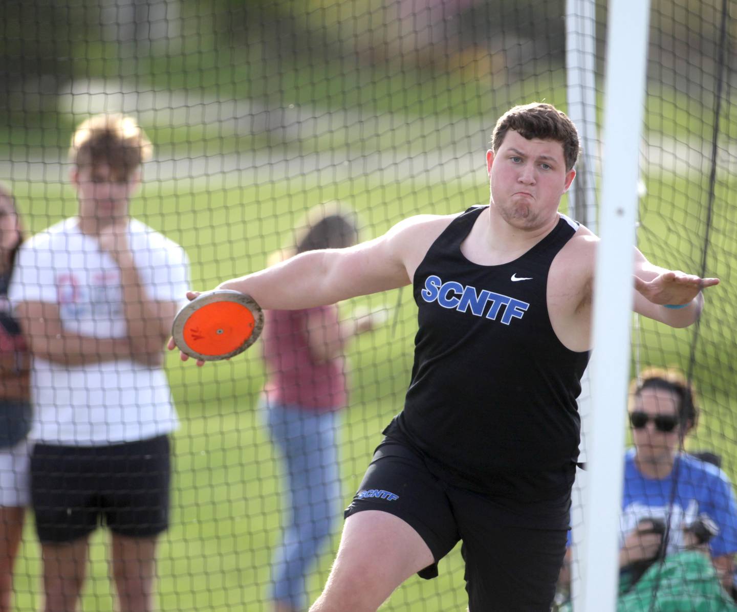 St. Charles North’s Henry Warsaw competes in the discus during the Kane County Championships track and field meet at St. Charles North on Friday, May 5, 2023.