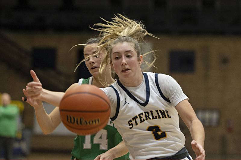 Sterling’s Olivia Melcher reaches for a pass against Geneseo Thursday, Dec. 7, 2023 at Sterling High School.