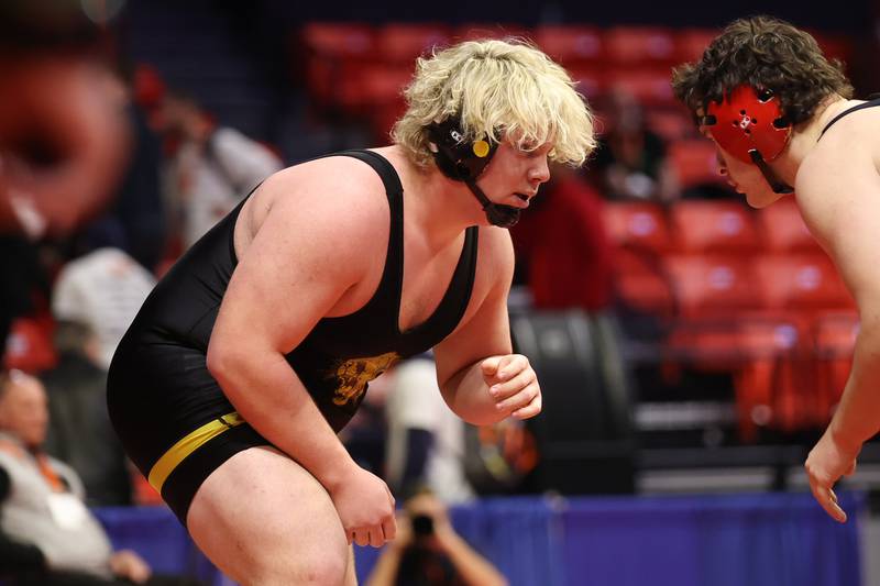 Glenbard North’s Paulie Robertson works against Pekin’s Tyler Haynes in the Class 3A 285lb. 3rd place match at State Farm Center in Champaign. Saturday, Feb. 19, 2022, in Champaign.