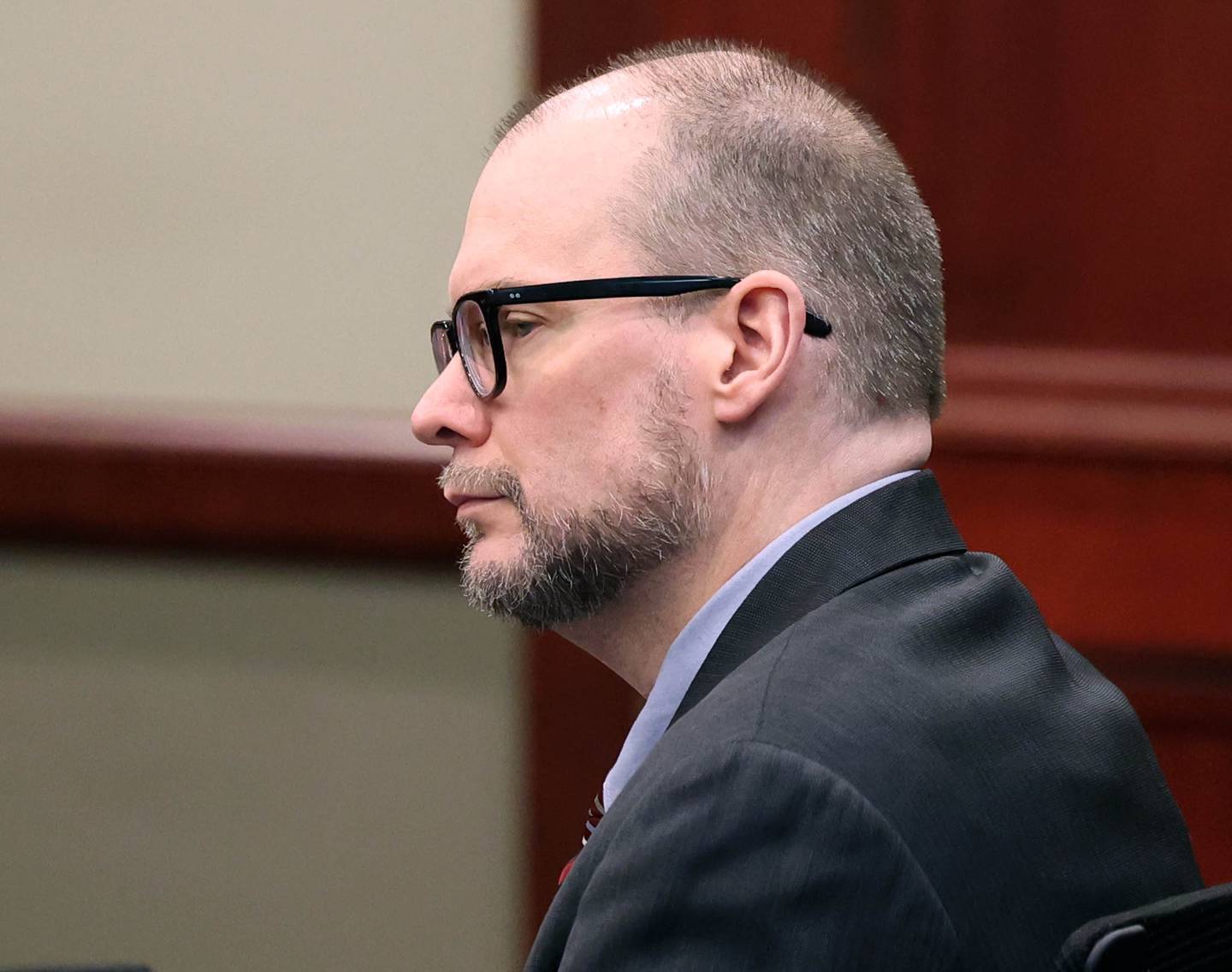 Jonathan D. Hurst listens as the verdict is about to be read Thursday, Jan. 30, 2025, during day his trial at the DeKalb County Courthouse in Sycamore. Hurst is charged in the 2016 killings of elderly mother and son Patricia and Robert Wilson in Sycamore.