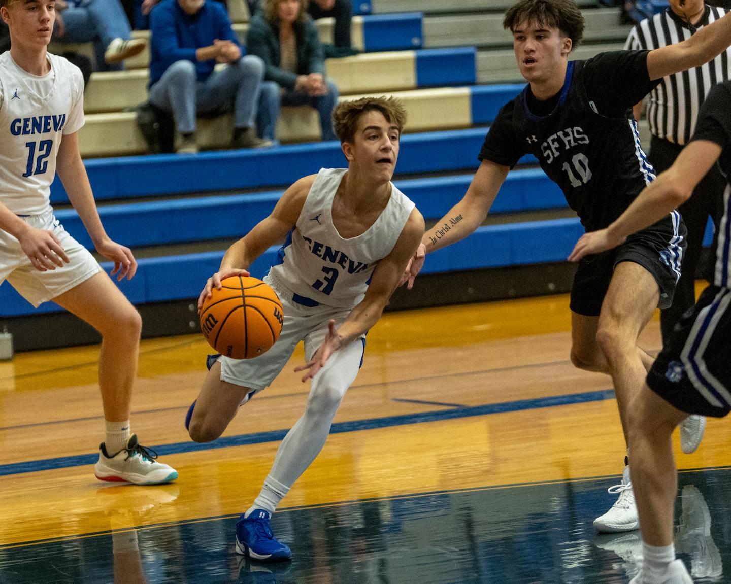 Geneva's Nathan Palmer drives the baseline against St. Francis at the 3rd Annual Bob Schick Thanksgiving Tournament on Friday, Nov.28,2025 in Geneva.