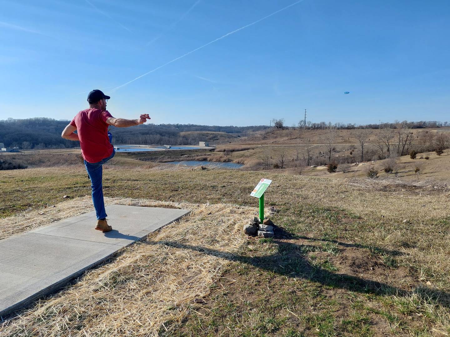 Jeremy Washkowiak fires his disc from the tee box Sunday, March 3, 2024, at the new disc golf course at Rotary Park in La Salle.
