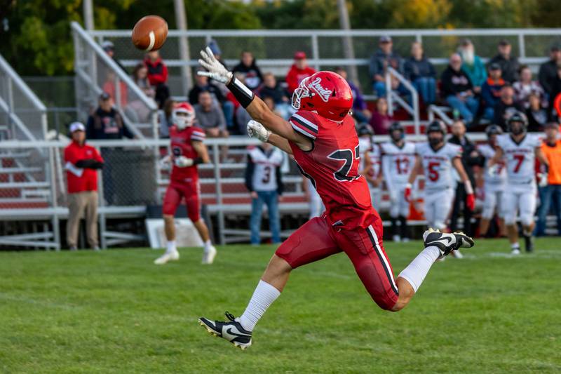 Jack Curran (23) of Hall leaps to catch pass on Friday, Sept 5, 2025 at Richard Nesti Stadium in Spring Valley.