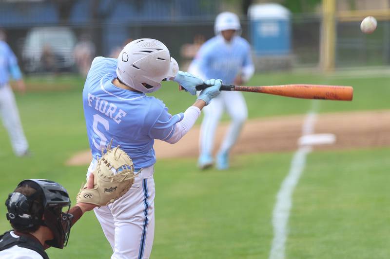 Nazareth’s Marco Fiore drives in a run gainst Joliet Catholic on Wednesday, April 29, 2026 in Joliet.