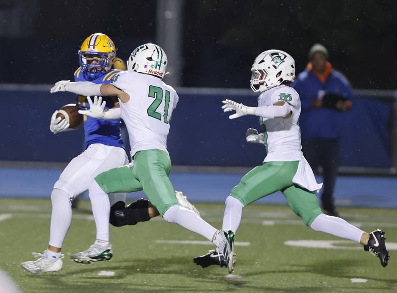 Lyons' Brady Rusk (7) runs after making a reception during the varsity football first-round 8A playoff game between York and Lyons Township on Friday, Oct. 31, 2025 in Western Springs, IL.