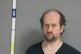 Earlville man charged with downloading illicit video