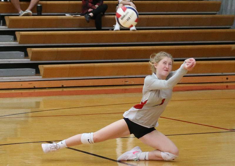 Woodland's libero Jaylei Leinninger dives fot the ball against Henry-Senachwine on Thursday, Oct. 3, 2024 at Henry-Senachwine High School.