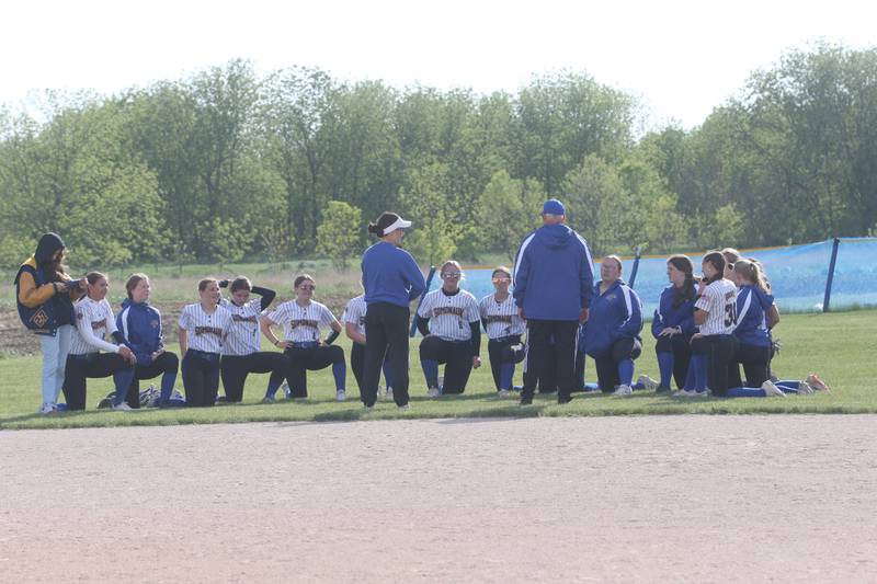 Members of the Somonauk/Leland softball team meet in the outfield after the Class 1A Regional quarterfinal game on Monday, May 19, 2025 at Somonauk High School.