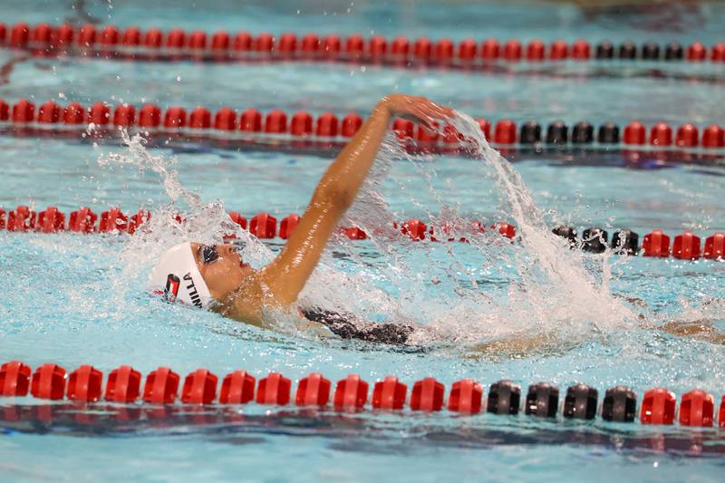 Bradley-Bourbonnais' Abby Bonilla leads in the 100-yard backstroke during Bradley-Bourbonnais' victory over Kankakee and Bishop McNamara in the All-City swim meet on Tuesday, Sept. 9, 2025.