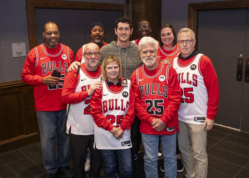 Patients pose with former Bulls point guard Kirk Hinrich at the fourth annual Hoops & Hearts game Feb. 12 at the United Center.