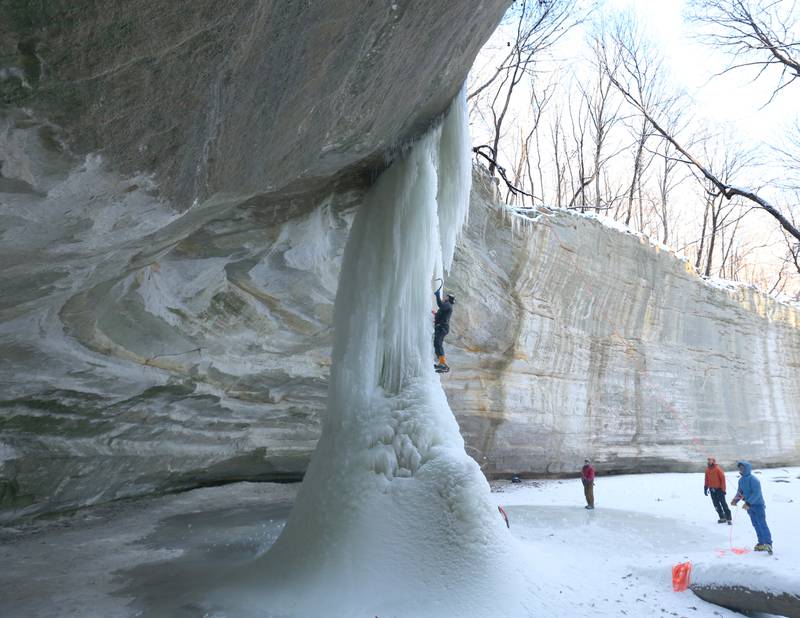 Joel Taylor of Tulsa Okla. formally of Monee, climbs a 40-foot frozen waterfall in Ottawa Canyon at Starved Rock State Park on Friday, Jan. 19, 2024 in Starved Rock State Park. The waterfalls tend to freeze for a brief time during January at the State Parks. Climbers need to sign in and out at the front of the Park Maintenance Building across from the Visitor Center. Climbing is only allowed in 4 canyons at the park.