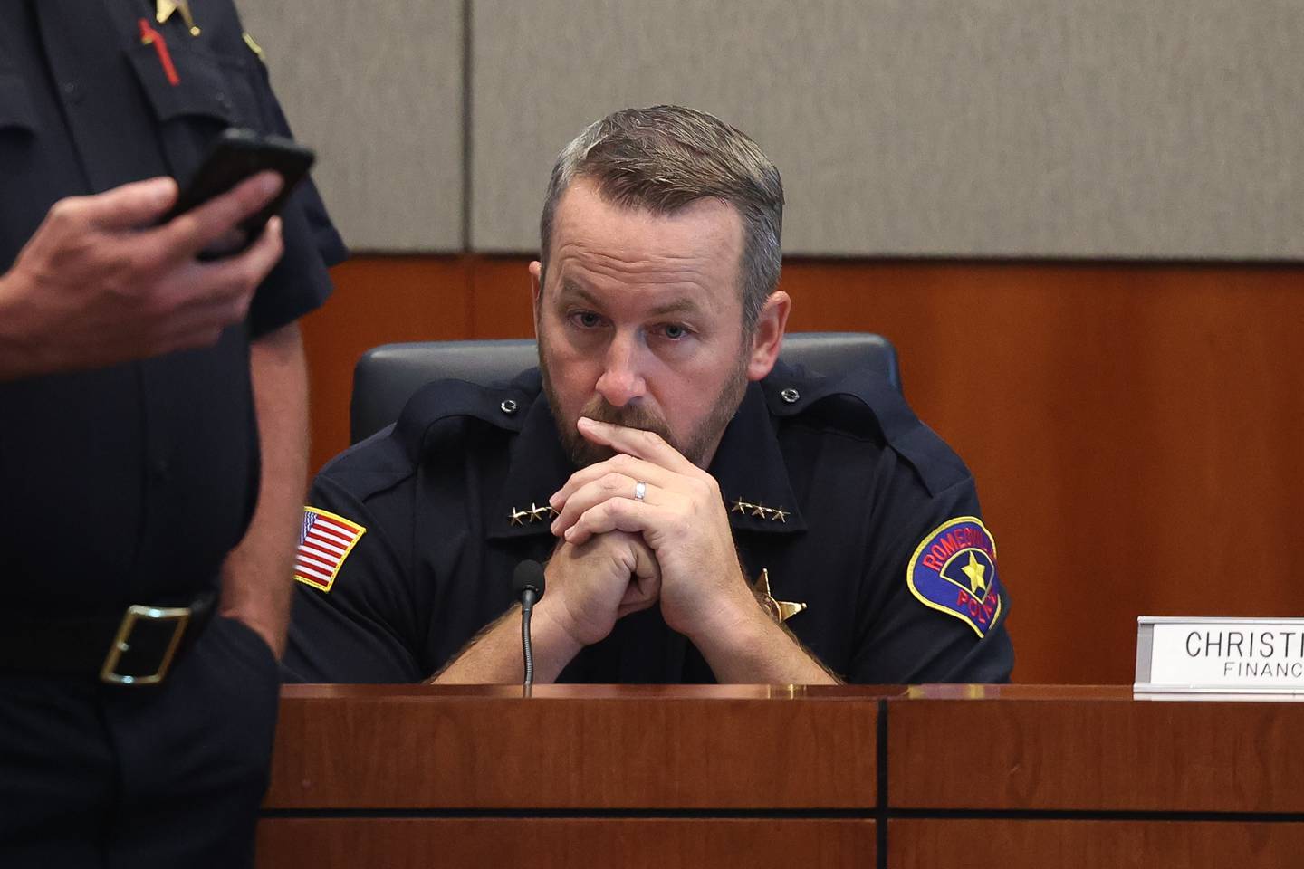 Romeoville Police Chief Brant Hromadko attends a press conference on police finding four bodies on Sunday, two adults and two children, with gunshot wounds during a well-being check on Monday, Sept. 18, in Romeoville.