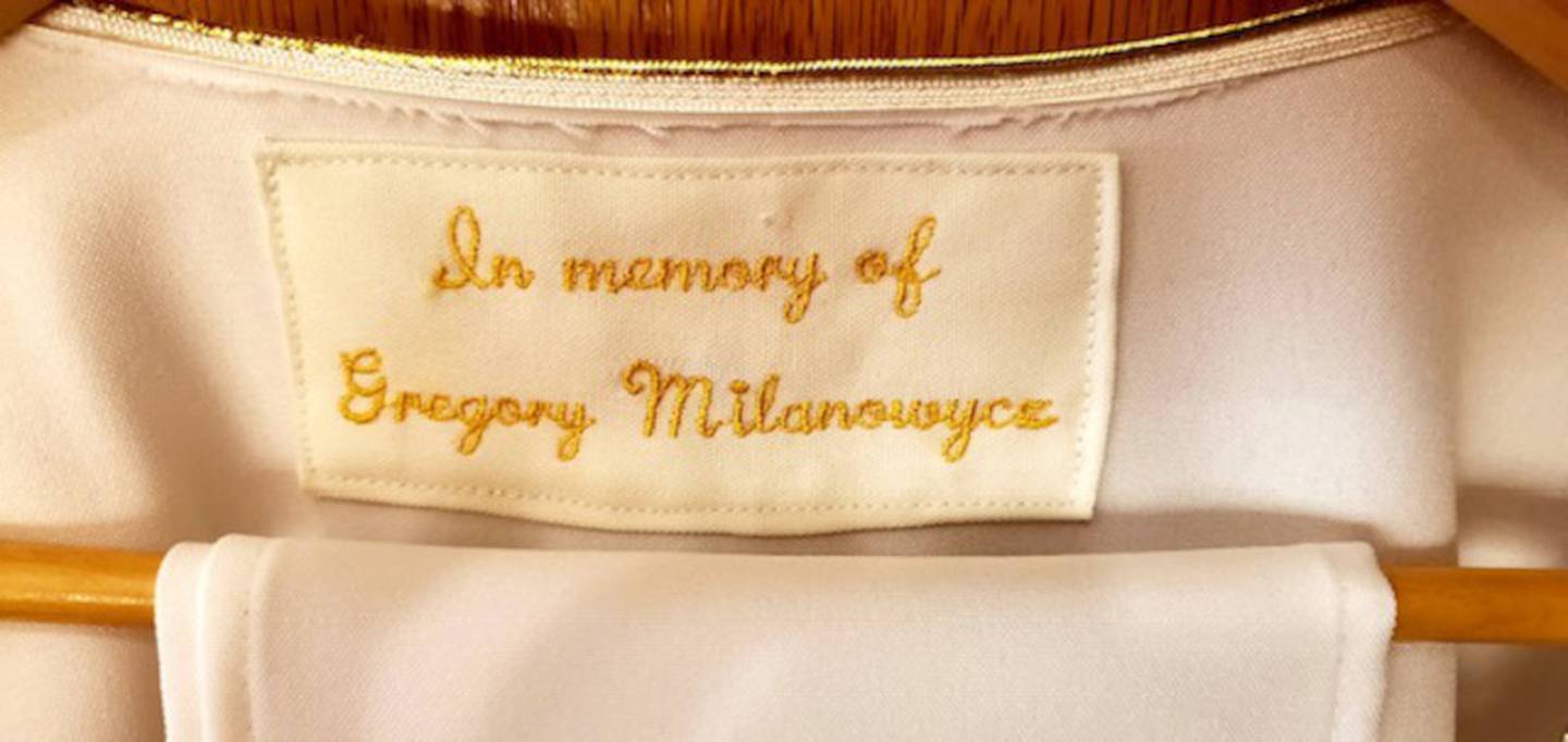 The  inscription sewn into the chasuble.