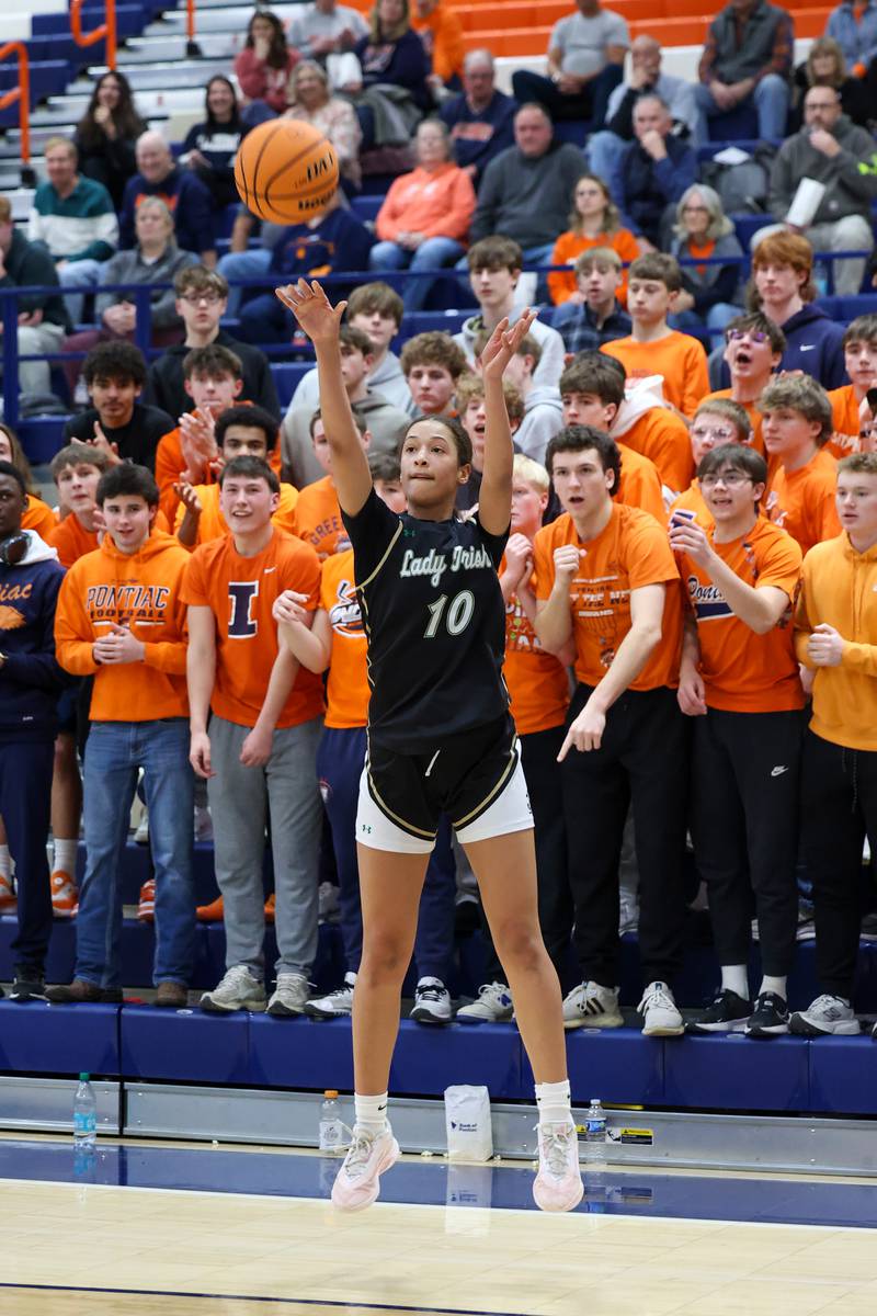 Bishop McNamara’s Trinitee Thompson shoots a 3-pointer during the Fightin’ Irish’s 46-32 loss to Pontiac in the IHSA Class 2A Pontiac Sectional semifinal on Tuesday, Feb. 24, 2026, at Pontiac Township High School.