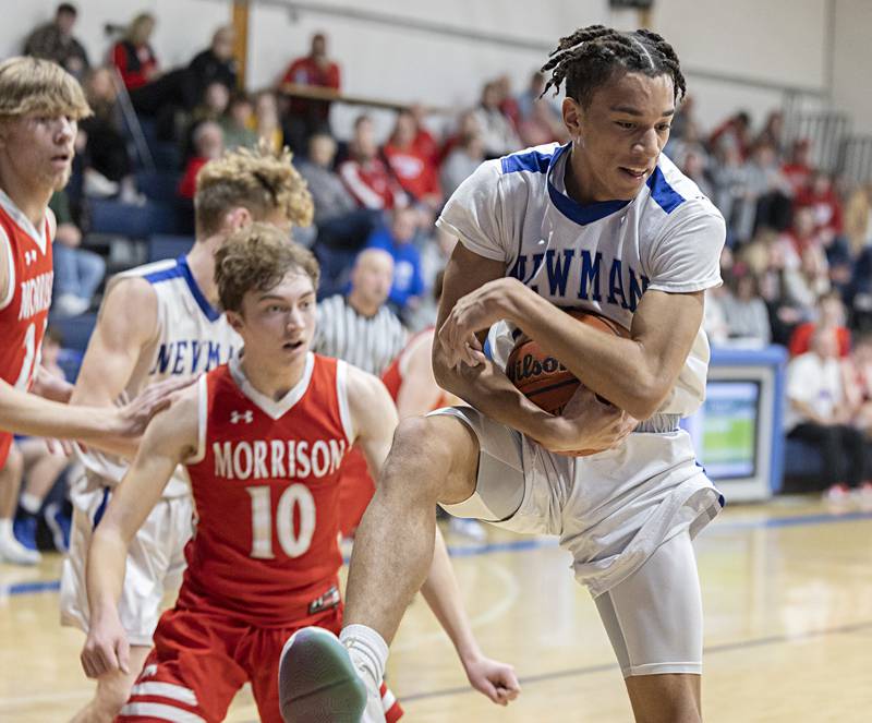 Newman’s Isaiah Williams secures a rebound against Morrison Wednesday, Jan. 3, 2024 at Newman High School.