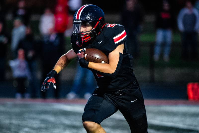Lincoln-Way Central's Luke Tingley runs the ball during a game against Providence on Friday Sept. 5, 2025, at Lincoln-Way Central High School in New Lenox.