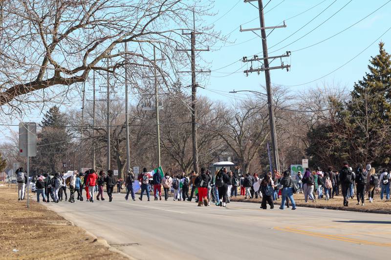 Kankakee High School students begin leaving the school for a walkout in protest of national immigration policies and Immigration and Customs Enforcement actions on Friday, Feb. 13, 2026.