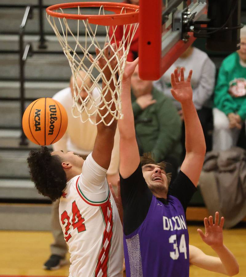L-P's Marion Persich and Dixon's Armahn McGowan miss a rebound on Tuesday, Jan. 20, 2026 in Sellett Gymnasium at L-P High School.