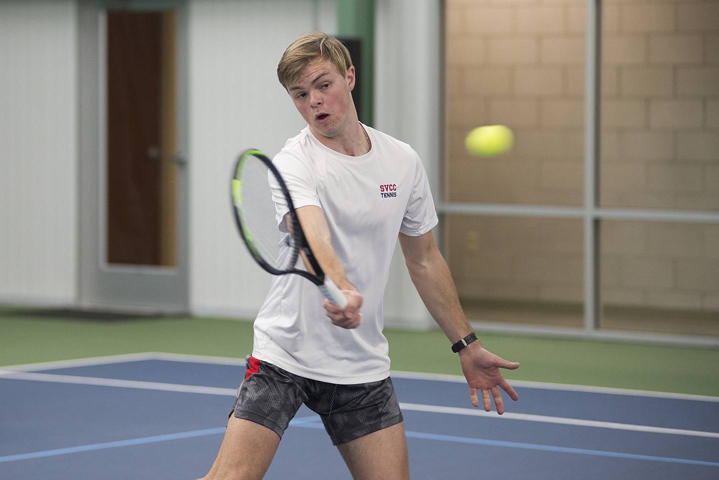 Sauk Valley College's Preston Engel returns a shot during a doubles match with dad Corey Saturday, April 2, 2022 at Westwood in Sterling. The father-son duo took on Milwaukee Area Tech's Josh Zaborski and Tim Haspel.