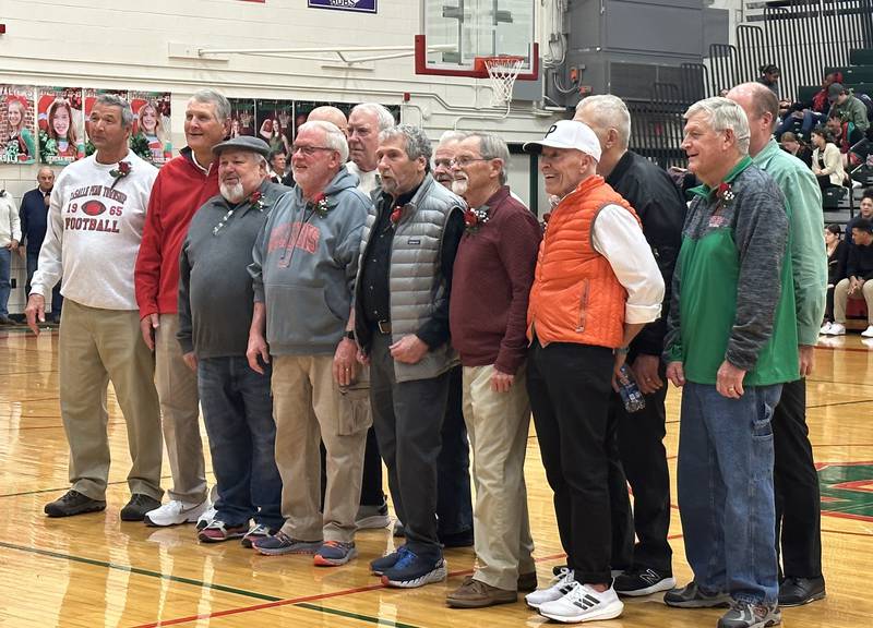 Members of the the 1965 L-P football team are honored at halftime in Sellett Gymnasium as part of the 2023  L-P Hall of Fame class on Friday, Jan. 13, 2023 at L-P High School.