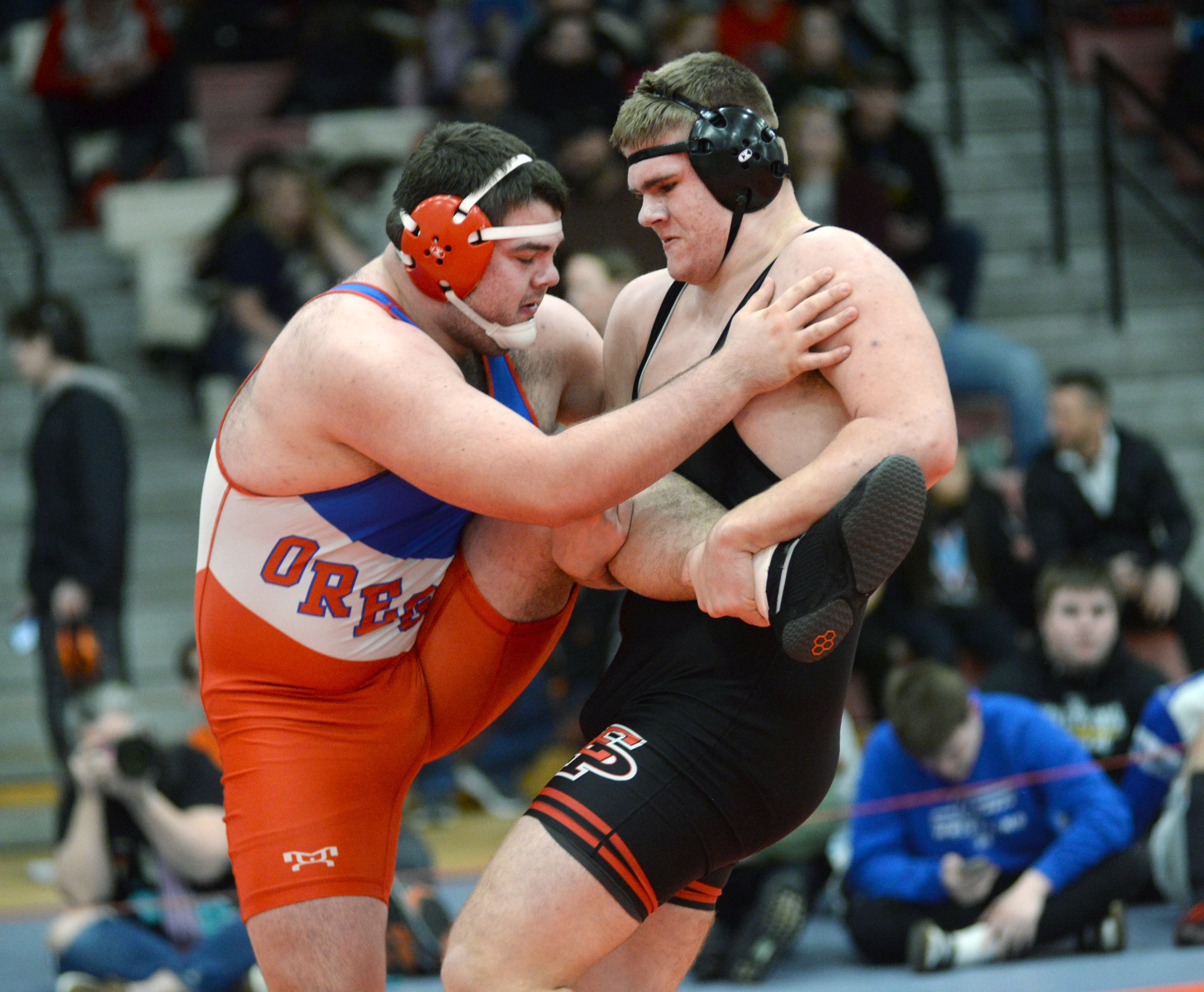 Oregon's Briggs Sellers (left) and Erie-Prophetstown's Caleb Reymer wrestle in a 285-pound match at the 1A Oregon Sectional on Friday, Feb. 14, 2025.